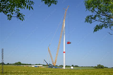 Installation Of A Wind Turbine High Crane Lifting The Nacelle Onto The