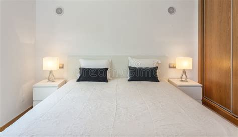 Bedroom In Modern Style With Bed And Pillows Front View Stock Image