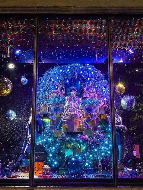 A Window Display With Lights And Decorations On It