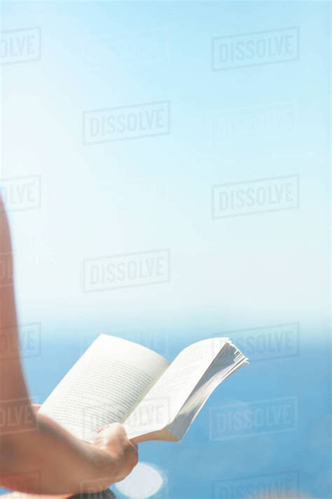 Hands Holding Book Stock Photo Dissolve