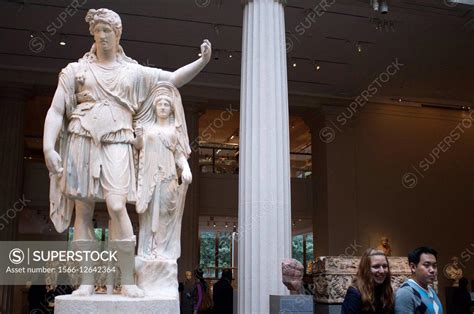 Marble Statue Of Dionysos Leaning On An Archaistic Female Figure Roman