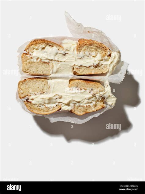 Sesame Bagel with cream cheese Stock Photo - Alamy