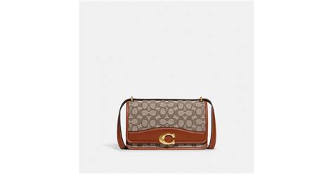 Coach Bandit Shoulder Bag In Signature Textile Jacquard In Brown Lyst