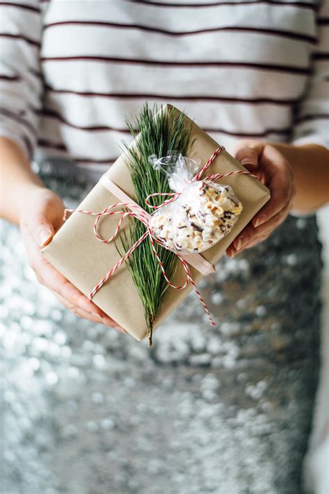 Holiday Gift Wrapping DIY with Fresh Greenery | By Gabriella