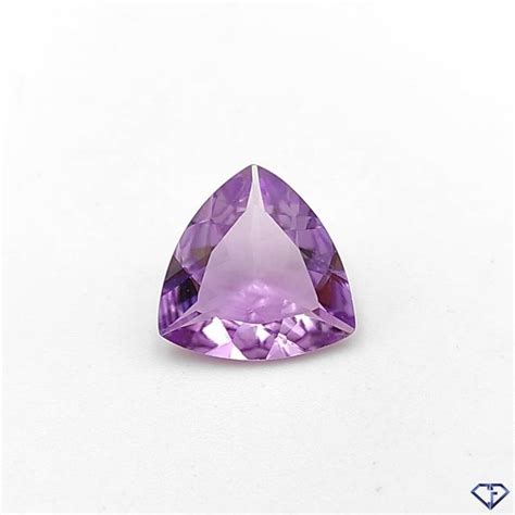 A Very Pretty Purple Stone On A White Surface