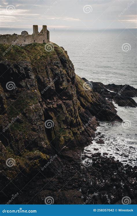 Early Morning View Of Dunnottar Castle In Scotland A Vertical Shot