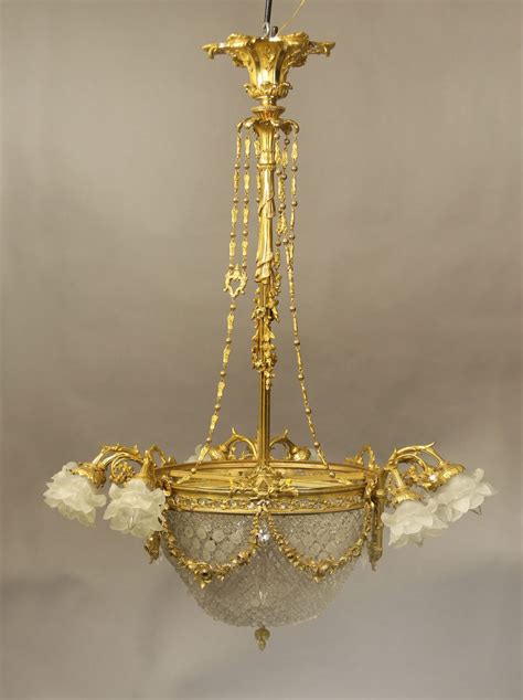 An Exceptional Late Th Century Gilt Bronze And Crystal Fourteen Light