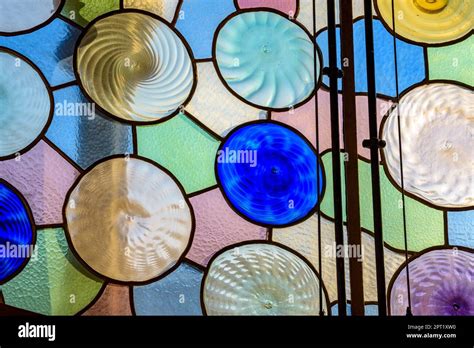 Original modernist stained glass windows designed by Antoni Gaudí on