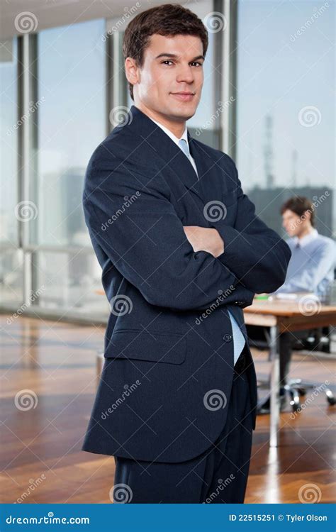 Confident Businessman Standing With Arms Crossed Stock Image Image Of