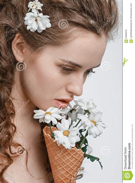 Attractive Young Woman With Spring Flowers Isolated On White Stock