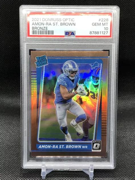 2021 DONRUSS OPTIC Amon Ra St Brown Recrue Bronze PSA 10 GEMM Lions