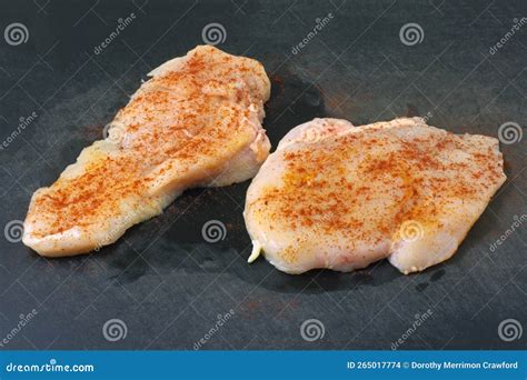 Boneless Raw Chicken Breasts With Paprika Stock Photo Image Of