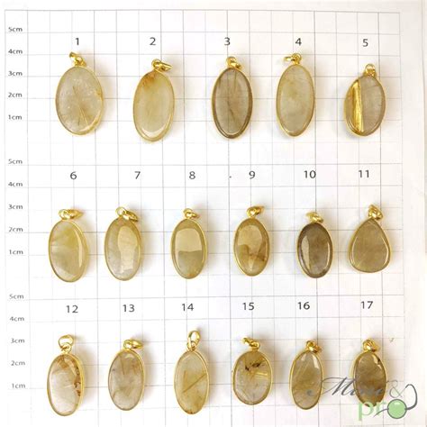 Quartz rutile pendentifs cerclés dorés Mine pro grossiste de