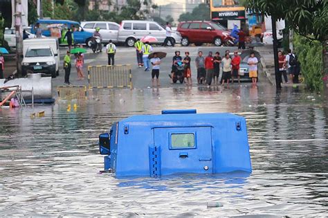 Areas In Quezon City Flooded After Torrential Rainfall Surpassing