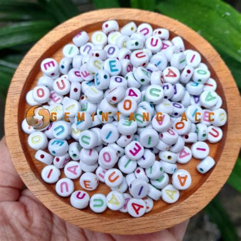 Jual 100 Pcs Manik Huruf Vocal A I U E O Manik Mote Huruf Bulat Pipih