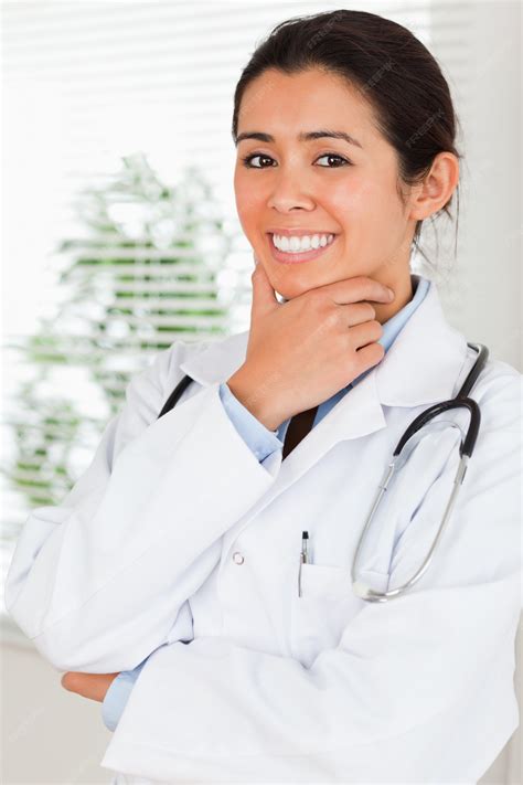 Premium Photo Beautiful Female Doctor With A Stethoscope Posing While