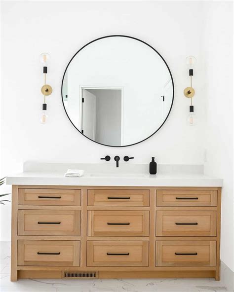 Modern Bathroom With Natural Wood Vanity And Round Mirror Soul Lane