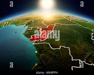 Sunrise Above Congo Highlighted In Red On Model Of Planet Earth In