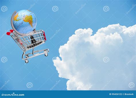 Earth On Shopping Cart Flying At Blue Sky Stock Photo Image Of