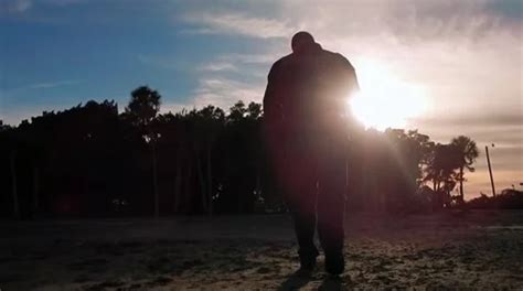 Silhouette Of Man Walking Into Sunset Stock Video Pond