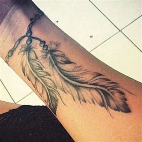 57 Attractive Wrist Feather Tattoos