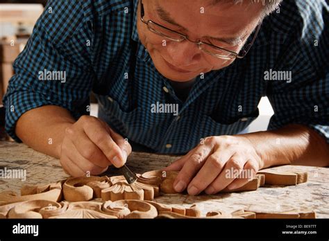 Chinese Man Wood Carving Hi Res Stock Photography And Images Alamy