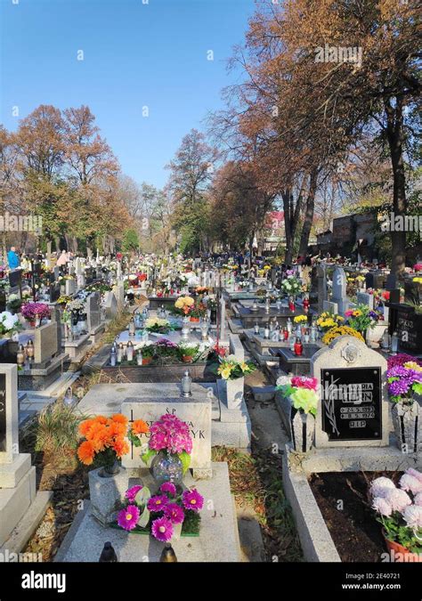 BYTOM, POLAND - NOVEMBER 1, 2019: People visit cemetery during All ...