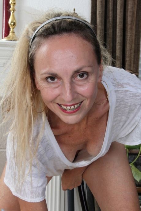 Mature Milf Sienna Strips Naked Shows Her Hairy Pussy During A