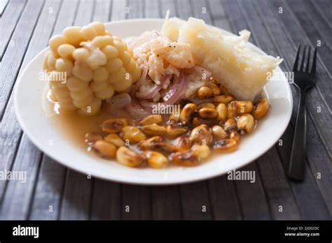 Peruvian traditional dish.fish ceviche with yuka and corn Stock Photo ...