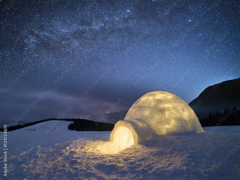 Winter night landscape with a snow igloo and a starry sky Stock Photo ...