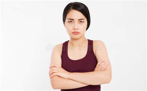 Angry Sad Asian Girl With Crossed Arms On White Background Portrait