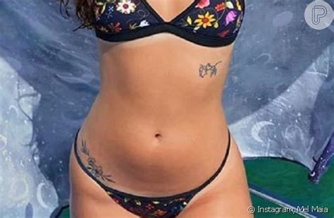 Mel Maia de biquíni asa delta exibe tatuagem em foto Veja Purepeople