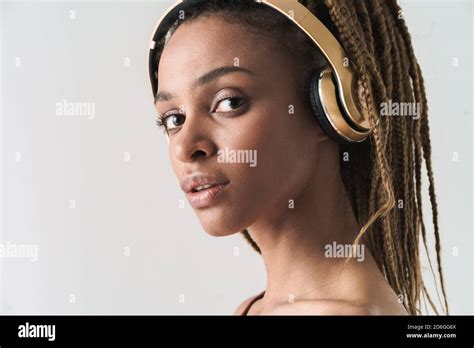 Close Up Portrait Of Beautiful African Brunette Woman With Dreadlocks A