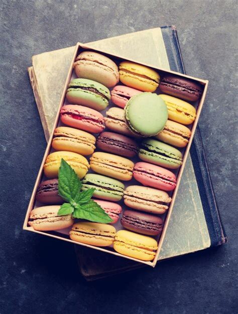 Premium Photo Colorful Macaroons In A Box Over Book