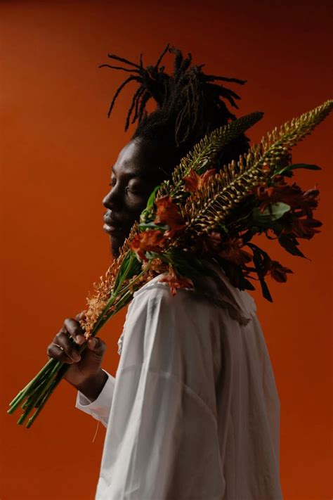 Man Holding Flowers
