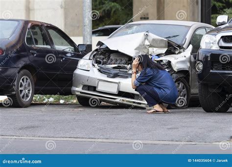 Asian Upset Driver Woman In Front Of Automobile Crash Car Collision