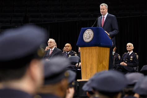 Speaking At Police Academy Graduation De Blasio Is Greeted With