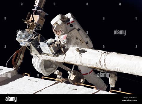 Astronaut Participating In Extravehicular Activity Stock Photo Alamy