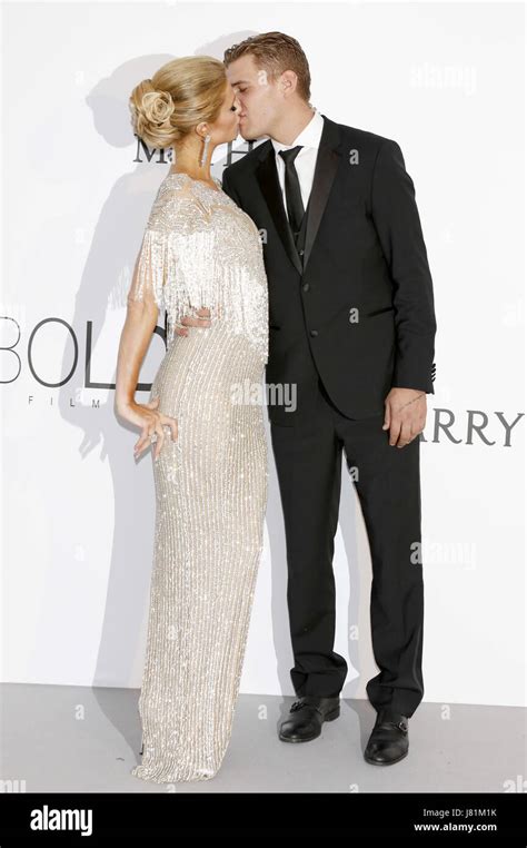 Paris Hilton And Chris Zylka Attending The AmfAR S 24th Cinema Against