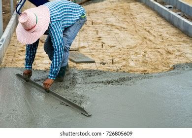 Man Finishing Concrete After Pouring Stock Photo 725739685 Shutterstock