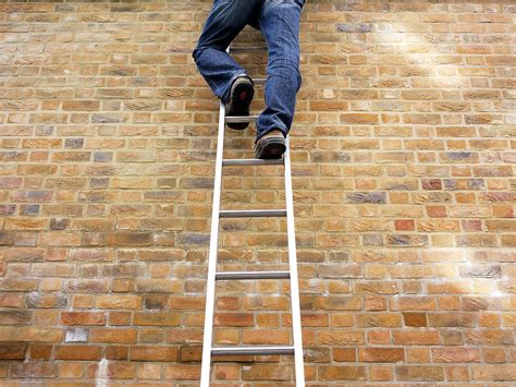 Man Climbing A Ladder Photograph By Tony Mcconnell