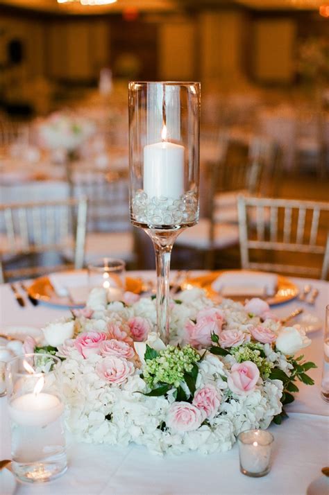 Pillar Candle And Blush Floral Wedding Reception Centerpieces Wedding Reception Decorations