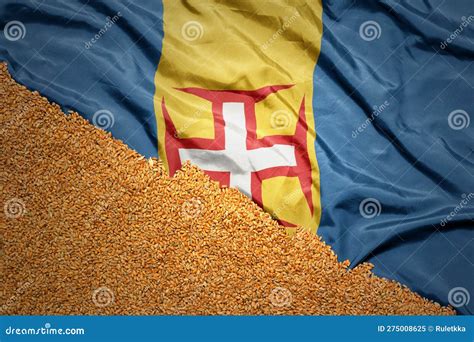 Wheat Grain On The Waving Colorful National Flag Of Madeira Macro Shot