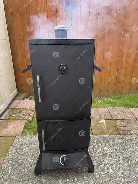 gas smoker cooking bbq style  food   grill stock image
