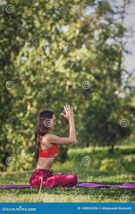 Young Woman Practicing Yoga Outdoors Female Meditate Outdoor In The