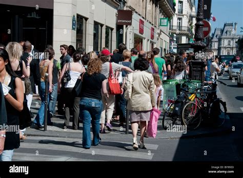 Paris France Crowd Of People Walking Shopping On Rue De Rivoli