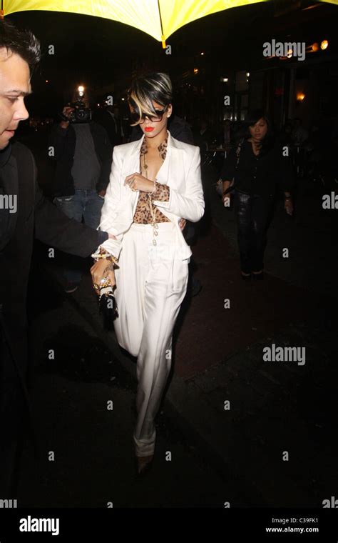 Rihanna Leaves Da Silvano Restaurant Wearing A White Pant Suit And