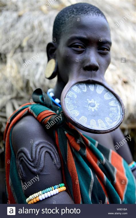 Woman With Lip Plate Which Signifies She Is A Married Woman She Also