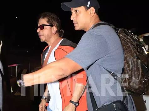 PHOTOS Shah Rukh Khan Looks Uber Cool In A White And Orange Ensemble