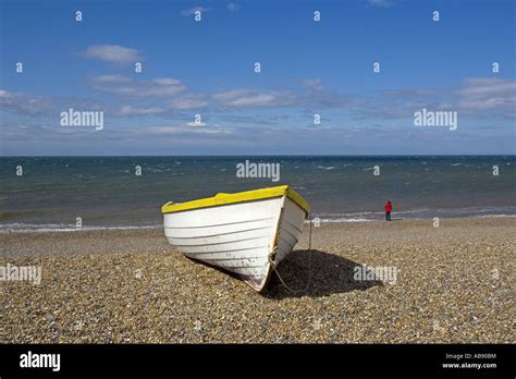 Fishing Boats Hauled Up On Weybourne Beach Norfolk Stock Photo Alamy